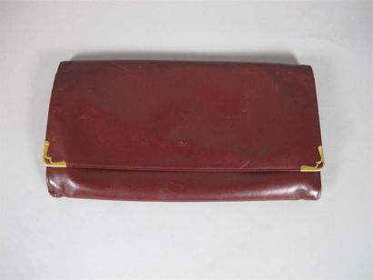 CARTIER Paris
Pochette en cuir bordeaux,...
