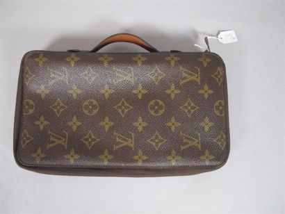 Louis VUITTON Paris
Pochette porte-feuille...