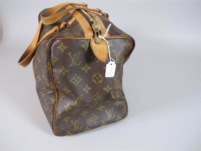 Louis VUITTON Paris
Petit sac de voyage en...