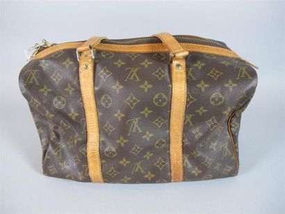 Louis VUITTON Paris
Petit sac de voyage en...
