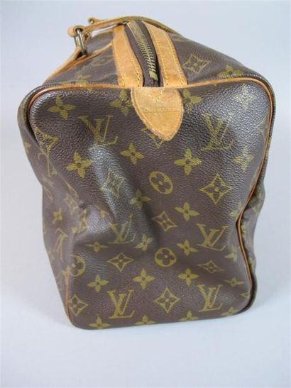 Louis VUITTON Paris
Petit sac de voyage en...