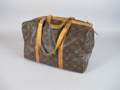 Louis VUITTON Paris
Petit sac de voyage en...