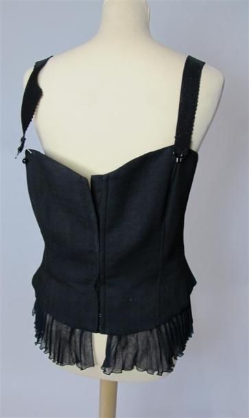Lot comprenant :
- ARMANI. Bustier à bretelles...