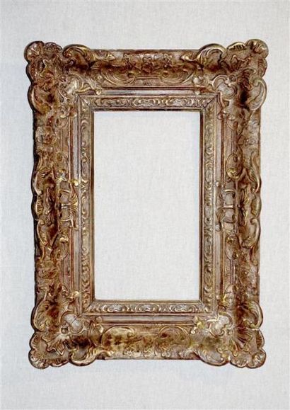 Cadre en bois sculpté et doré.
Haut. : 17...