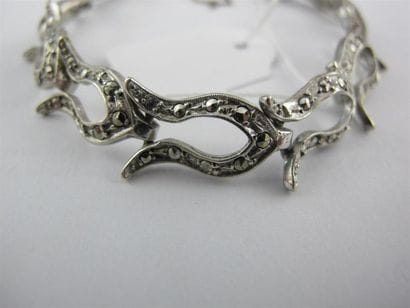 Bracelet à maillon U en argent. (Acciden...