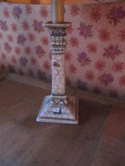 Deux bougeoirs en faïence montés en lamp...