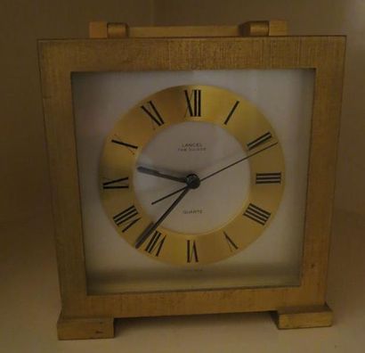 Une pendule Lancel.
Haut. : 17 cm ; Larg....