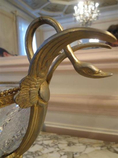 Trois vases en cristal, montures en bronze....