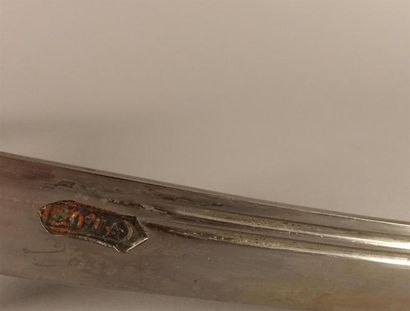 Sabre caucasien. 
Monture et fourreau recouvert...