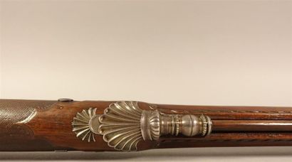 Superbe fusil de chasse à silex. 
Long et...