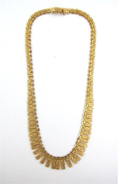 Collier articulé en or jaune 750 millièmes...