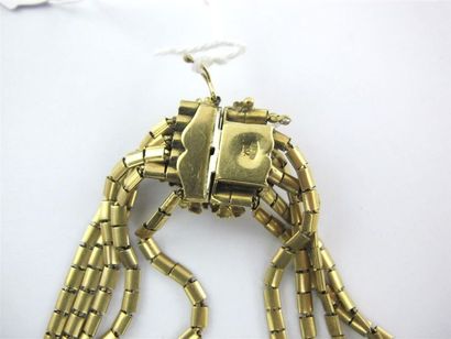 Bracelet six rangs articulés en or jaune...