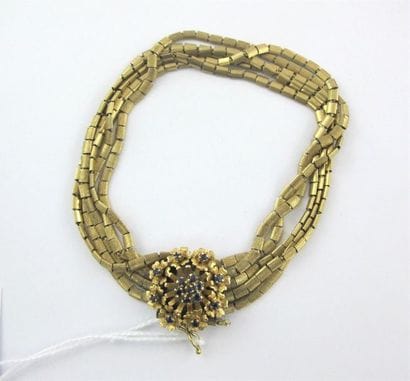 Bracelet six rangs articulés en or jaune...