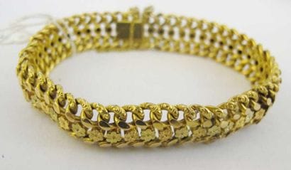 Bracelet articulé en or jaune 750 millièmes,...