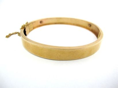 Bracelet rigide ouvrant en or jaune 750 millièmes,...