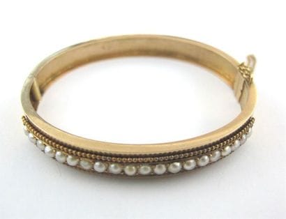 Bracelet rigide ouvrant en or jaune 750 millièmes,...