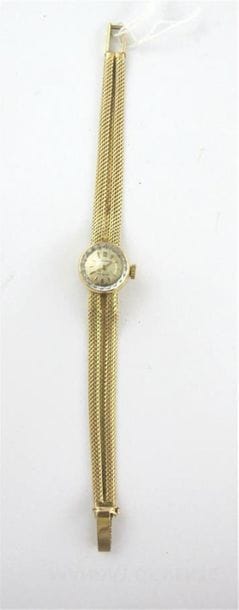 MOVADO
Montre-bracelet de dame en or jaune...