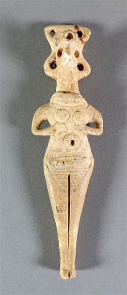 Idole féminine. Terre cuite. Vallée de l'Euphrate....