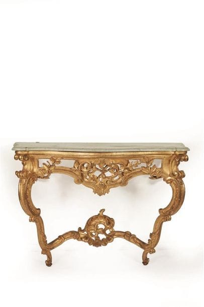 Console de forme mouvementée en bois redoré,...