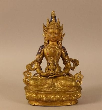 Bouddha en bronze doré.
Haut. : 22 cm ; Larg....