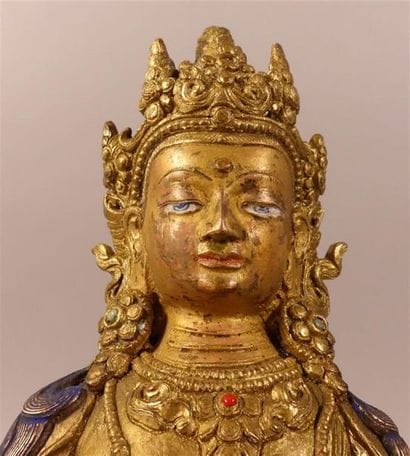Bouddha en bronze doré.
Haut. : 22 cm ; Larg....