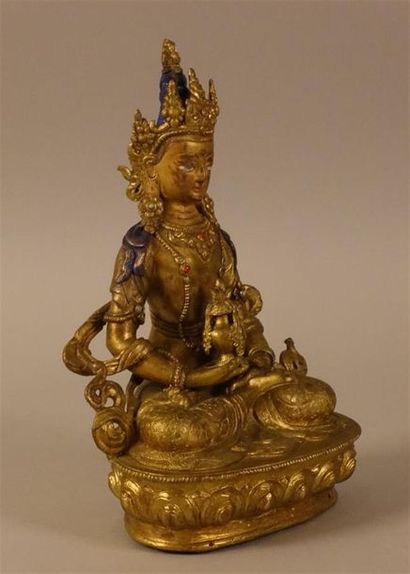 Bouddha en bronze doré.
Haut. : 22 cm ; Larg....
