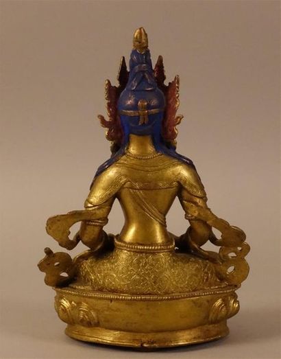Bouddha en bronze doré.
Haut. : 22 cm ; Larg....