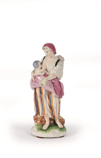NIDERVILLER
Figure en faïence à décor polychrome...