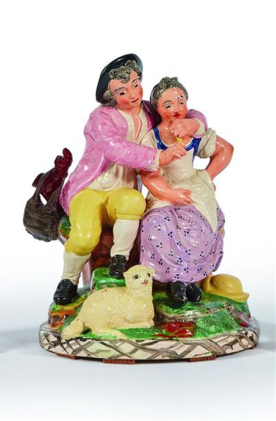 LES ISLETTES
Groupe à décor polychrome représentant...