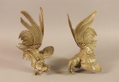 Deux faisans en métal argenté. 
Haut. : 20,5...