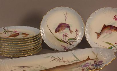 LIMOGES
Partie de service à poisson en porcelaine,...