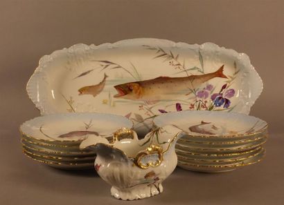LIMOGES
Partie de service à poisson en porcelaine,...