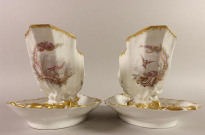 LIMOGES
Paire de saucières ovales en porcelaine...