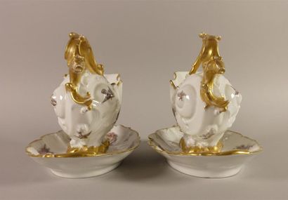 LIMOGES
Paire de saucières ovales en porcelaine...