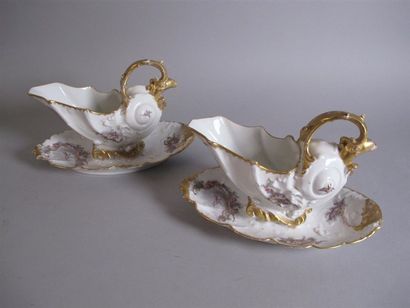 LIMOGES
Paire de saucières ovales en porcelaine...