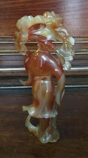 CHINE. Lot de deux statuettes guanine, une...