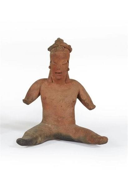 MEXIQUE
Jeune femme assise jambes écartées...