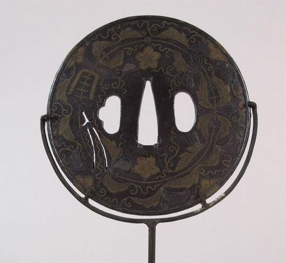 JAPON - XIXe siècle
Tsuba en fer incrusté...