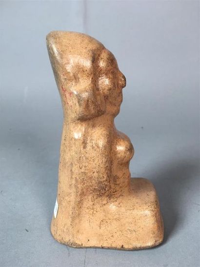 Style mexicain
Statuette féminine accroupie...