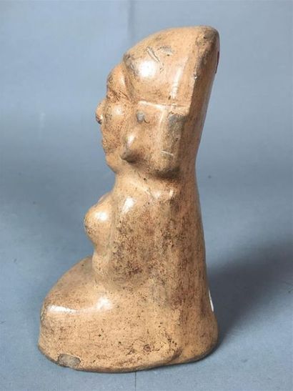 Style mexicain
Statuette féminine accroupie...