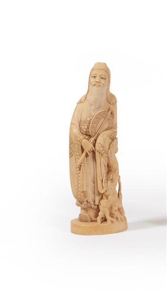 JAPON - Circa 1940
Groupe en ivoire sculpté...