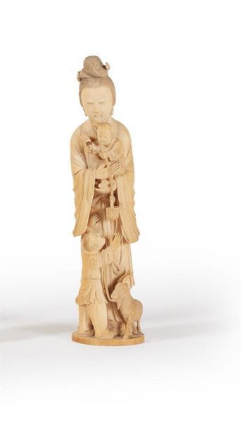 CHINE - Circa 1940
Groupe en ivoire sculpté...