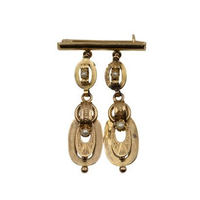 Broche en or jaune (750) retenant deux pendants...