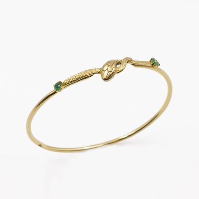 Bracelet jonc en or jaune (750) à décor d'un...