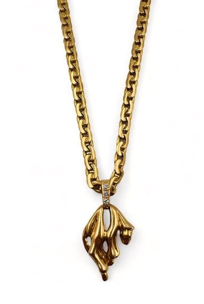 Collier en or jaune (750) à maille gourmette...