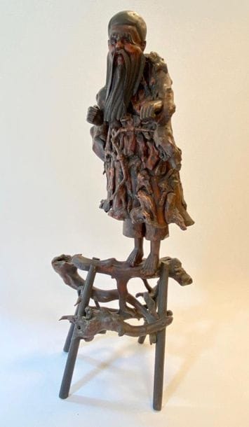 Large carved wooden subject featuring Shoulao

China,...
