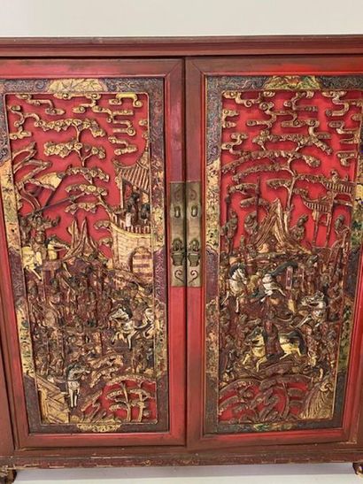 Red lacquered and gilded wooden cabinet with...