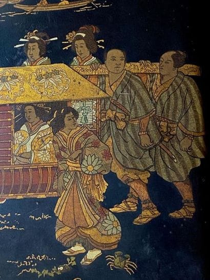Black lacquered toilet bag with golden characters...