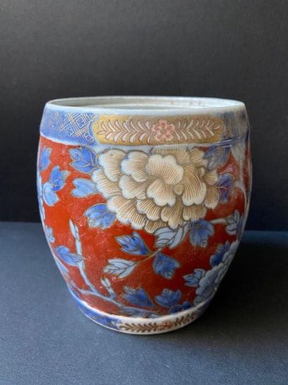 Small polychrome porcelain pot with flower...