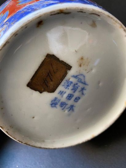 Small polychrome porcelain pot with flower...